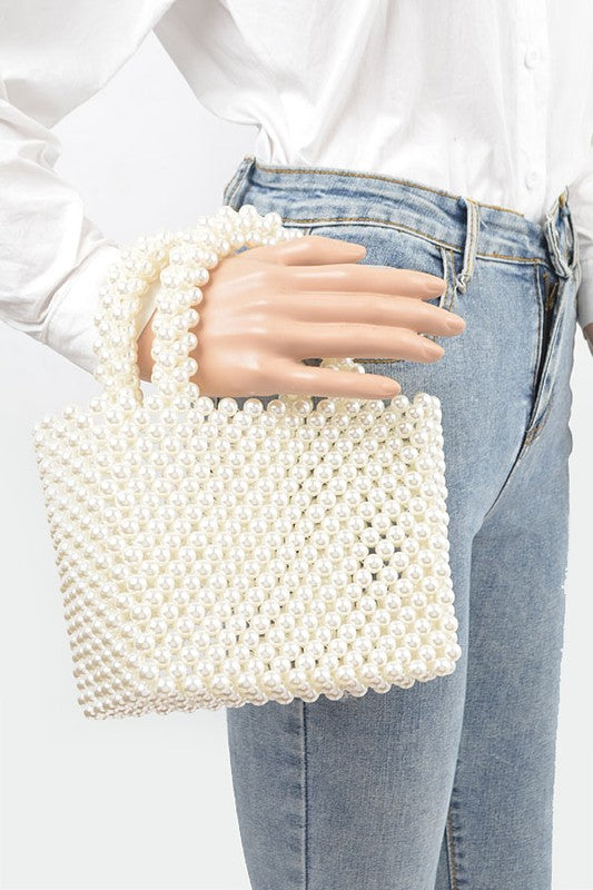 Bolso de mano icónico con asa superior trenzada y perlas sintéticas