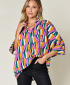 Full Size Geometric Notched Raglan Sleeve Blouse - Body By J'ne