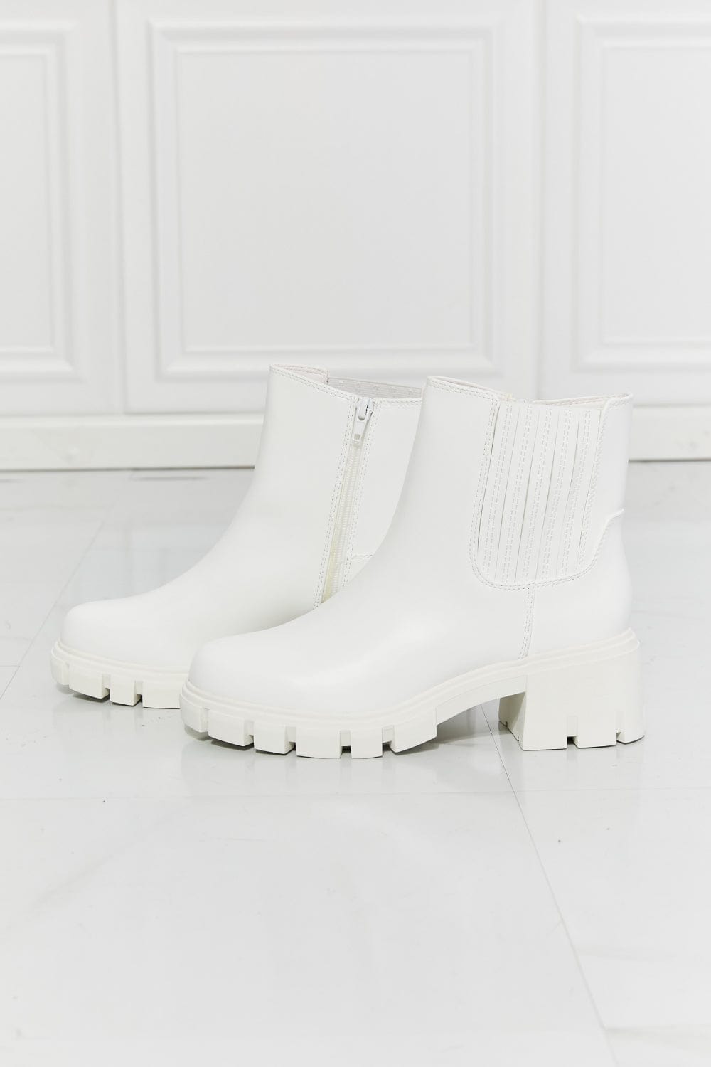 What It Takes Lug Sole Chelsea Boots in White - Body By J'ne